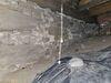Cold, Damp Crawl Space Repaired & Insulated in Pittsville, WI - Photo 2