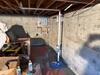 Damp Basement in Portland, ME Gets Waterproofing Treatment - Photo 1
