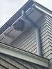 A Big Bald-Faced Hornet's Nest Located on the Soffit in Oakhurst, NJ - Photo 1