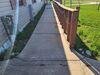 Concrete Driveway & Sidewalk Leveled, Stabilized and Joints Sealed in Luxemburg, WI - Photo 2