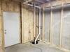 Wet Basement Waterproofing & Wall Stabilization in Spencer, WI - Photo 1