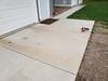 Concrete Garage Apron & Sidewalk Lifted and Stabilized in Spencer, WI - Photo 1