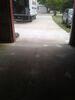 Settled Concrete Garage Floor Lifted and Stabilized with PolyLevel Foam in Abrams, WI - Photo 6