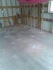 Settled Concrete Garage Floor Lifted and Stabilized with PolyLevel Foam in Abrams, WI - Photo 3