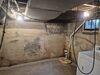 Sure-Dry Sump Pump and WaterGuard System Fixes Basement Water Issues in Sheboygan, WI - Photo 1
