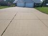 Concrete Driveway with Unlevel Slabs and Failing Expansion Joints Leveled and Protected in Combined Locks, WI - Photo 5