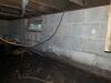 Musty Damp Crawl Space Encapsulated and Waterproofed In Wautoma, WI - Photo 1