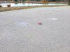 Cracked and Sunken Concrete Driveway Repaired With PolyLevel and NexusPro in Chilton, WI - Photo 4
