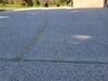 Cracked and Sunken Concrete Driveway Repaired With PolyLevel and NexusPro in Chilton, WI - Photo 3