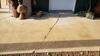 Cracked and Failing Concrete Entryway to Garage Sealed and Repaired in Elton, WI - Photo 1