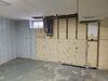 Wet Basement Repaired with Waterproofing System Installation in Argonne, WI - Photo 4