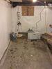Wet Moldy Basement Receives Waterproofing System Installation in Two Rivers, WI - Photo 4