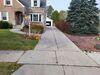 Uneven Driveway Lifted, Leveled and Repaired in Manitowoc, WI - Photo 1