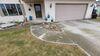 Concrete Driveway & Sidewalk Lifted, Leveled & Sealed in Manitowoc, WI - Photo 3