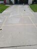 Concrete Driveway & Sidewalk Lifted, Leveled & Sealed in Manitowoc, WI - Photo 2