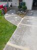 Concrete Driveway & Sidewalk Lifted, Leveled & Sealed in Manitowoc, WI - Photo 1