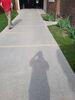 Concrete Lifting of Driveway and Sidewalk in Manitowoc, WI - Photo 4
