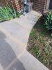 Concrete Lifting of Driveway and Sidewalk in Manitowoc, WI - Photo 5
