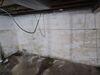Wet Basement Repaired with Sump Pump Installation in Marinette, WI - Photo 7