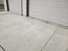 Uneven Concrete Driveway & Sidewalk Repaired with PolyLevel & Joint Sealant in Kiel, WI - Photo 2
