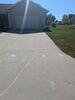 Cracked and Sunken Concrete Driveway Repaired in Marinette, WI - Photo 10