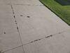 Cracked and Sunken Concrete Driveway Repaired in Marinette, WI - Photo 2