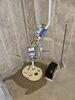 Water Intrusion Issues Resolved with Upgraded Sump Pump & IceGuard Discharge Line Systems in Stratford, WI - Photo 3