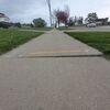 Concrete Repair Contractor, Sure-Dry, Levels Sidewalk in Markesan, WI - Photo 1