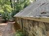 Gutter Installation in Cumming, GA | Gutter Replacement in Almond Color - Photo 1