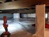Musty Crawlspace Problem Resolved with Vapor Barrier Installation in Brandon, WI - Photo 3