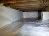 Musty Crawlspace Problem Resolved with Vapor Barrier Installation in Brandon, WI - Photo 1
