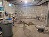 Wet Damp Basement Transformed with Waterproofing System & Support Posts in Fence, WI - Photo 3