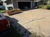 Cracked Driveway Lifted and Leveled in Redgranite, WI - Photo 3
