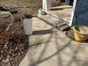 Sunken Concrete Driveway Lifted with PolyLevel in North Fond Du Lac, WI - Photo 1