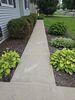 Concrete Garage Apron & Sidewalk Leveled & Repaired with PolyLevel Injection Foam and NexusPro Joint Sealant in Menasha, WI - Photo 4
