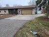 Uneven, Sunken Concrete Driveway Slabs Lifted & Sealed in Menasha, WI - Photo 6