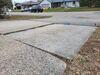 Uneven, Sunken Concrete Driveway Slabs Lifted & Sealed in Menasha, WI - Photo 4