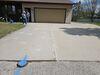 Uneven, Sunken Concrete Driveway Slabs Lifted & Sealed in Menasha, WI - Photo 2