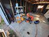 Concrete Garage Floor Leveled & Repaired with PolyLevel Foam in Menasha, WI - Photo 1