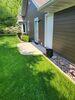 Sinking, Uneven Concrete Driveway Repaired & Sealed in Menasha, WI - Photo 3