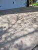Sinking, Uneven Concrete Driveway Repaired & Sealed in Menasha, WI - Photo 2