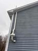 Radon Mitigation System Installed in East Haven Raised Ranch with Noise Consideration - Photo 1