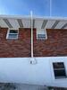 Two-Pipe Radon Mitigation System Installed in Watertown Home - Photo 1