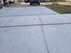 Cracked and Sunken Concrete Driveway Repaired in Oshkosh, WI - Photo 6