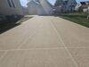 Cracked and Sunken Concrete Driveway Repaired in Oshkosh, WI - Photo 3