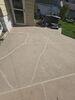 Cracked and Sunken Concrete Driveway Repaired in Oshkosh, WI - Photo 2