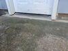Cracked and Sinking Concrete Driveway Repaired in Oshkosh, WI - Photo 3