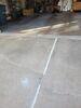 Cracked and Sinking Concrete Driveway Repaired in Oshkosh, WI - Photo 2