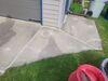 Dangerous Sunken Concrete Driveway Repaired in Menasha, WI - Photo 1