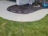 Sunken Concrete Driveway Lifted and Repaired in De Pere, Wisconsin - Photo 1